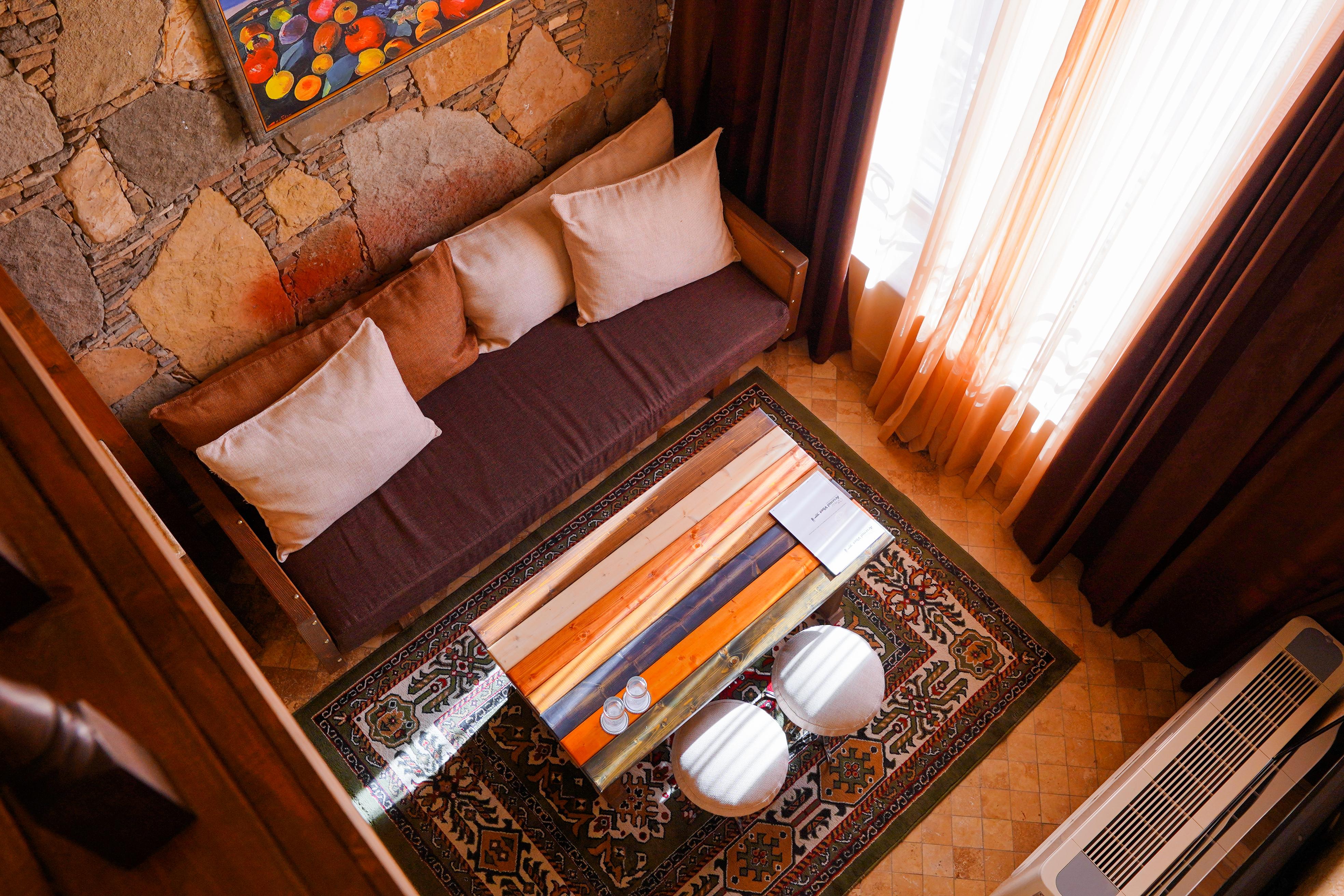 Caucasus Hotel Kasagh Exterior photo A living room with a carpet